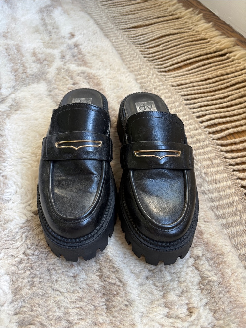 Black Leather Slip-On Loafers with Gold Accent